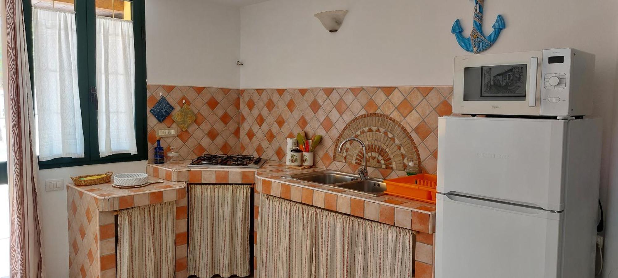 Casa Vacanze Laura ตอร์โตลี ภายนอก รูปภาพ